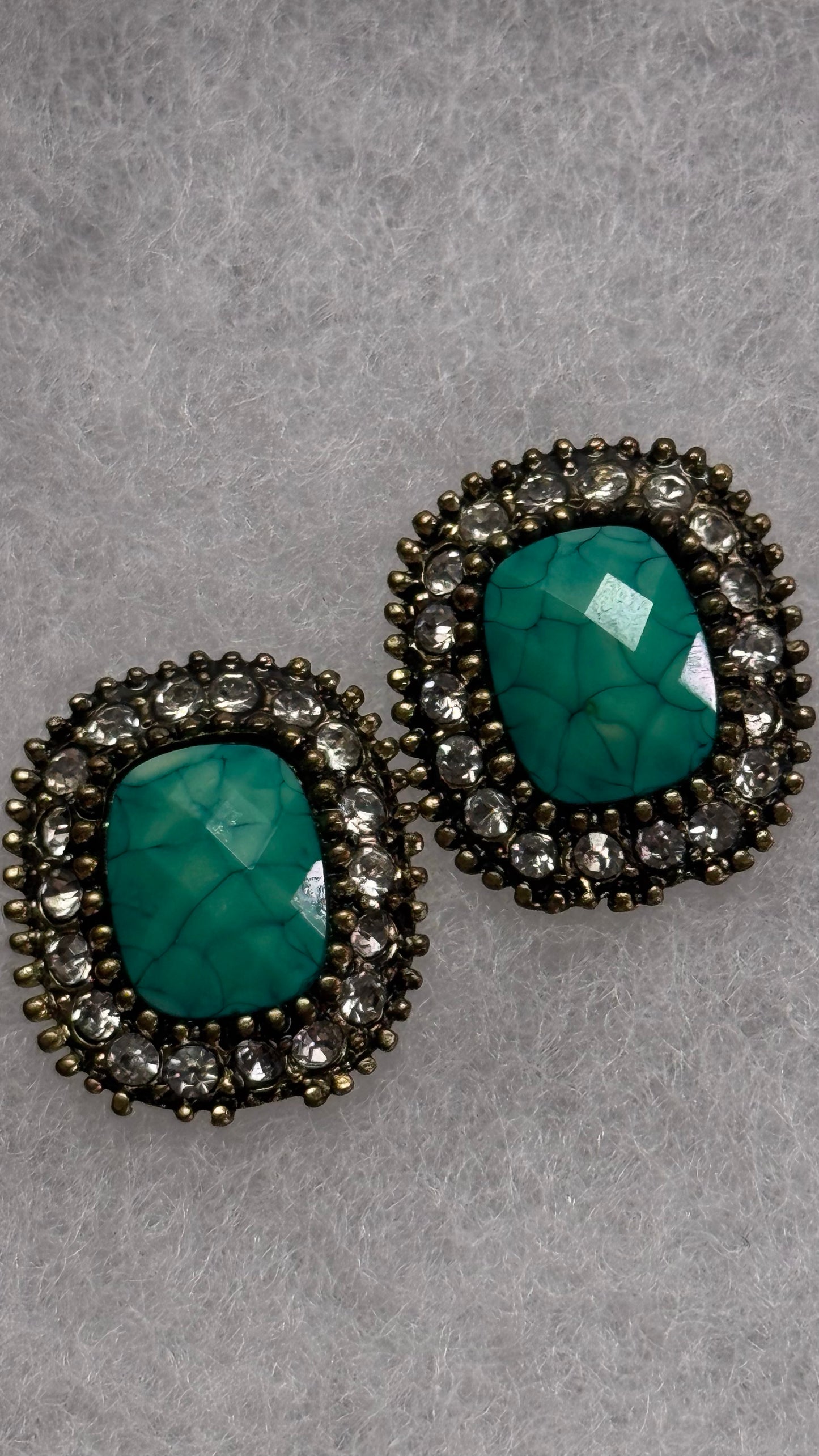 Vintage torques and diamond stud earrings