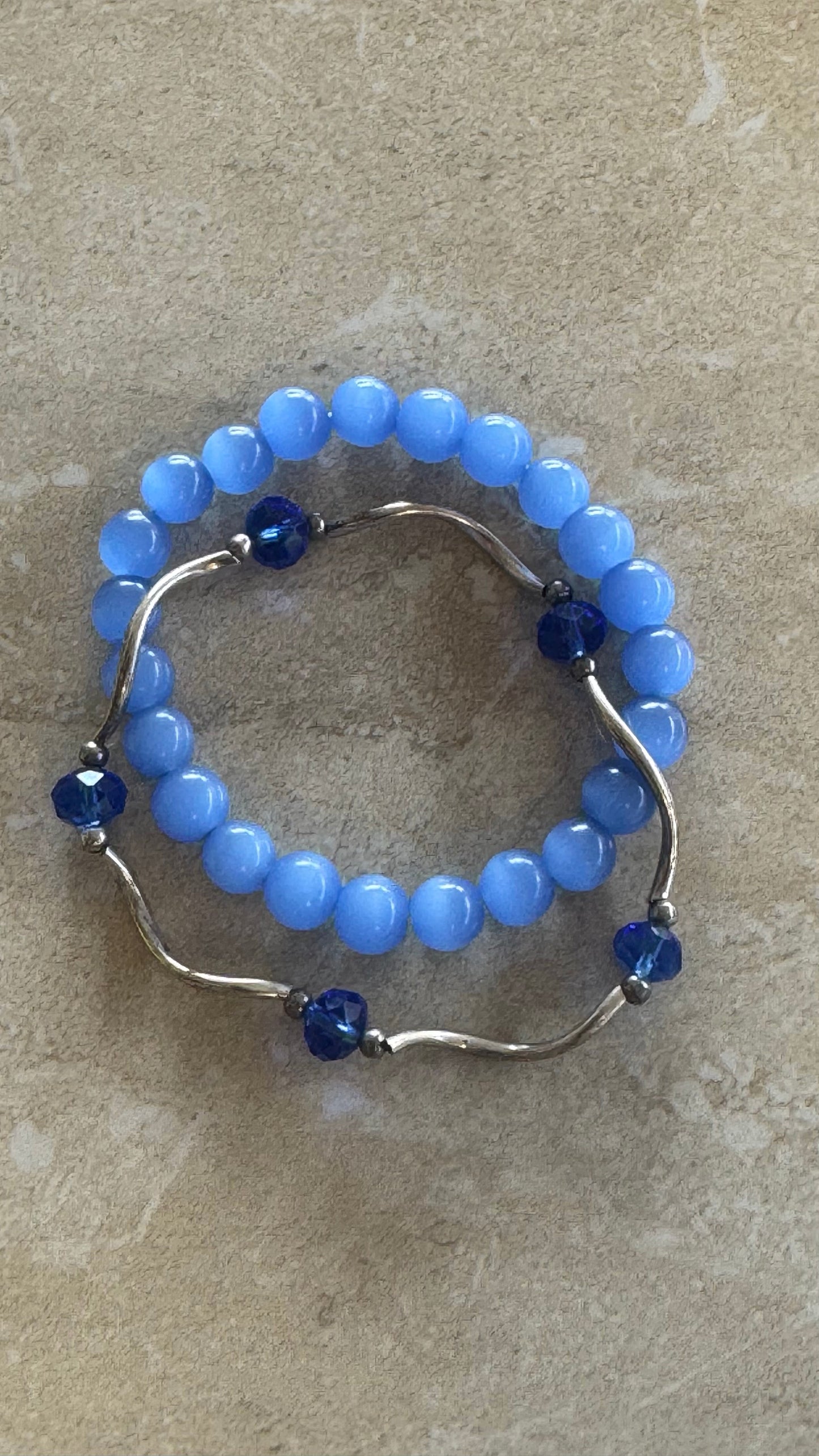 Two piece set blue beaded silver bracelets