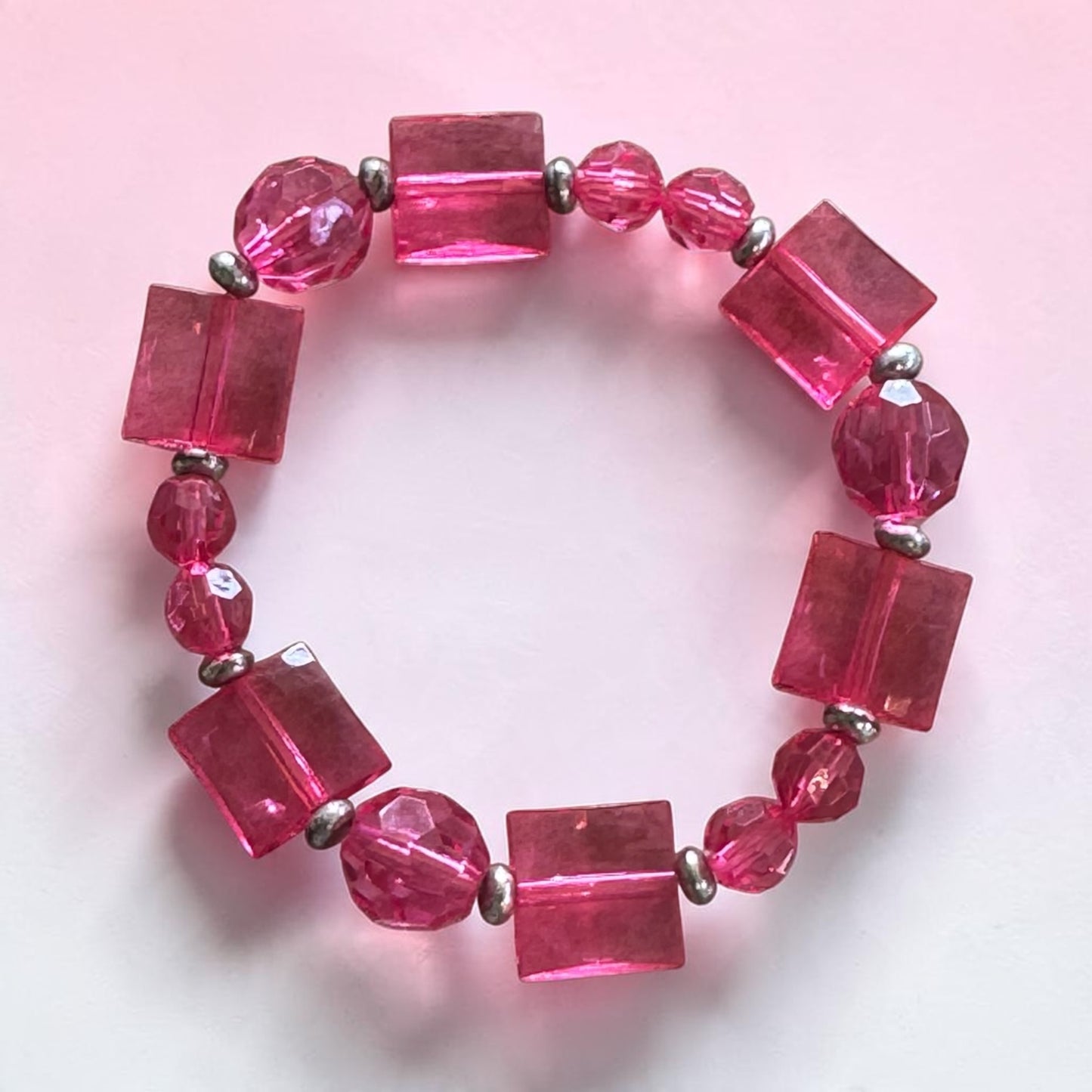 multi beaded pink flex bracelet 2(1/2)” diameter