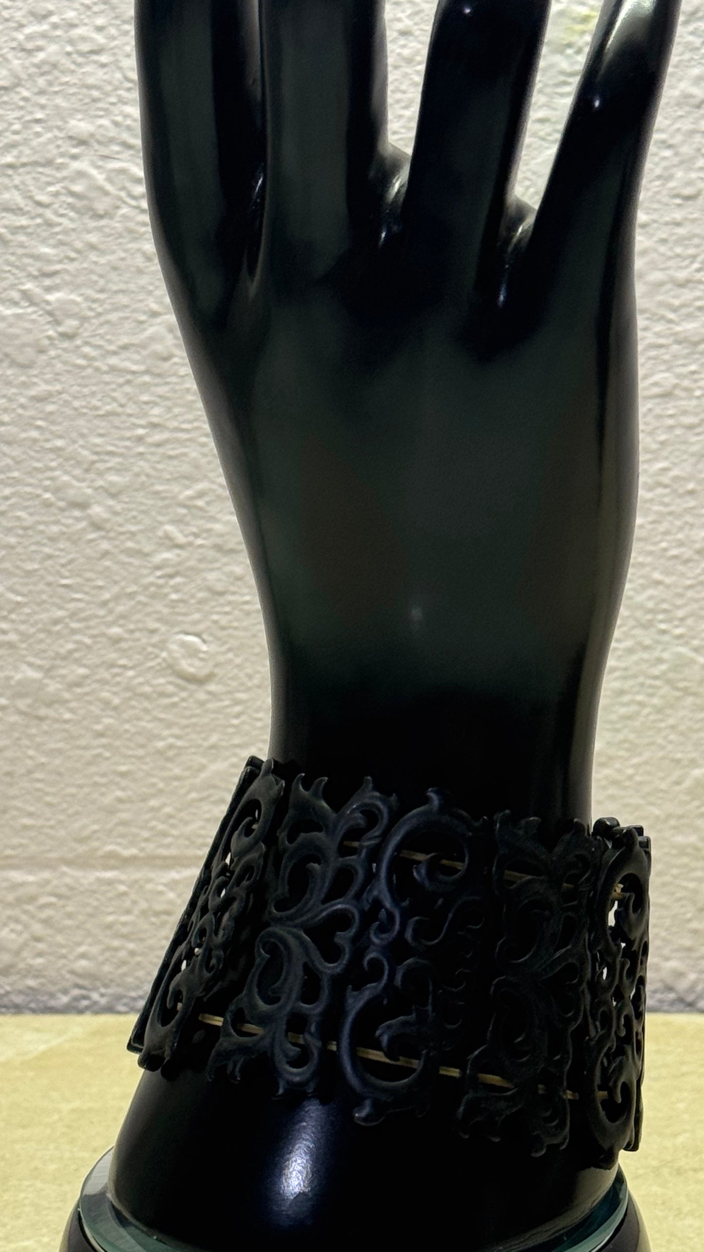 Artisanal Black Carved Openwork Stretch Cuff Bracelet with Gold-Toned Hardware