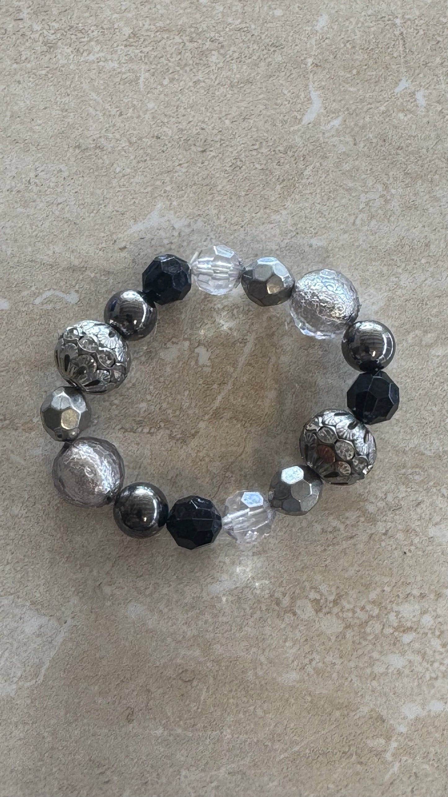 Vintage multi beaded black and silver flex bracelets 2(1/2)” diameter