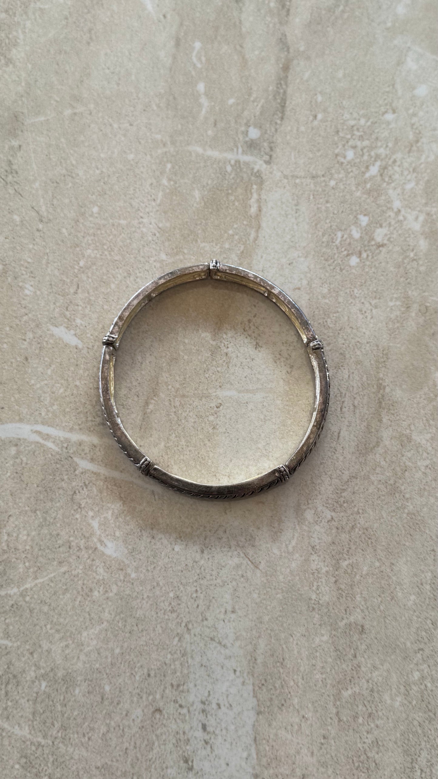 silver-tone segmented cable stretch  bangle 2 (3/4)” diameter adjustable