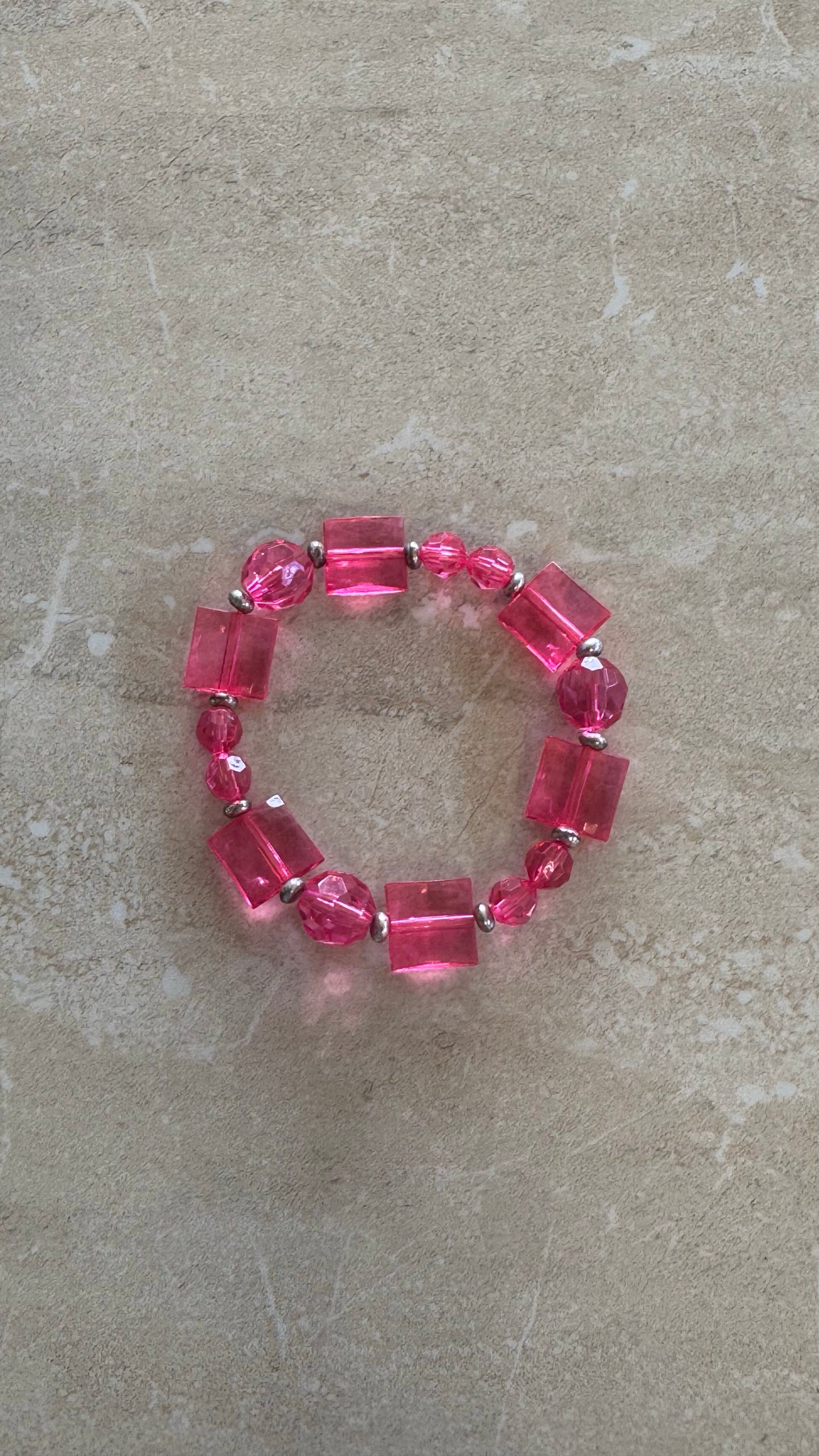 multi beaded pink flex bracelet 2(1/2)” diameter