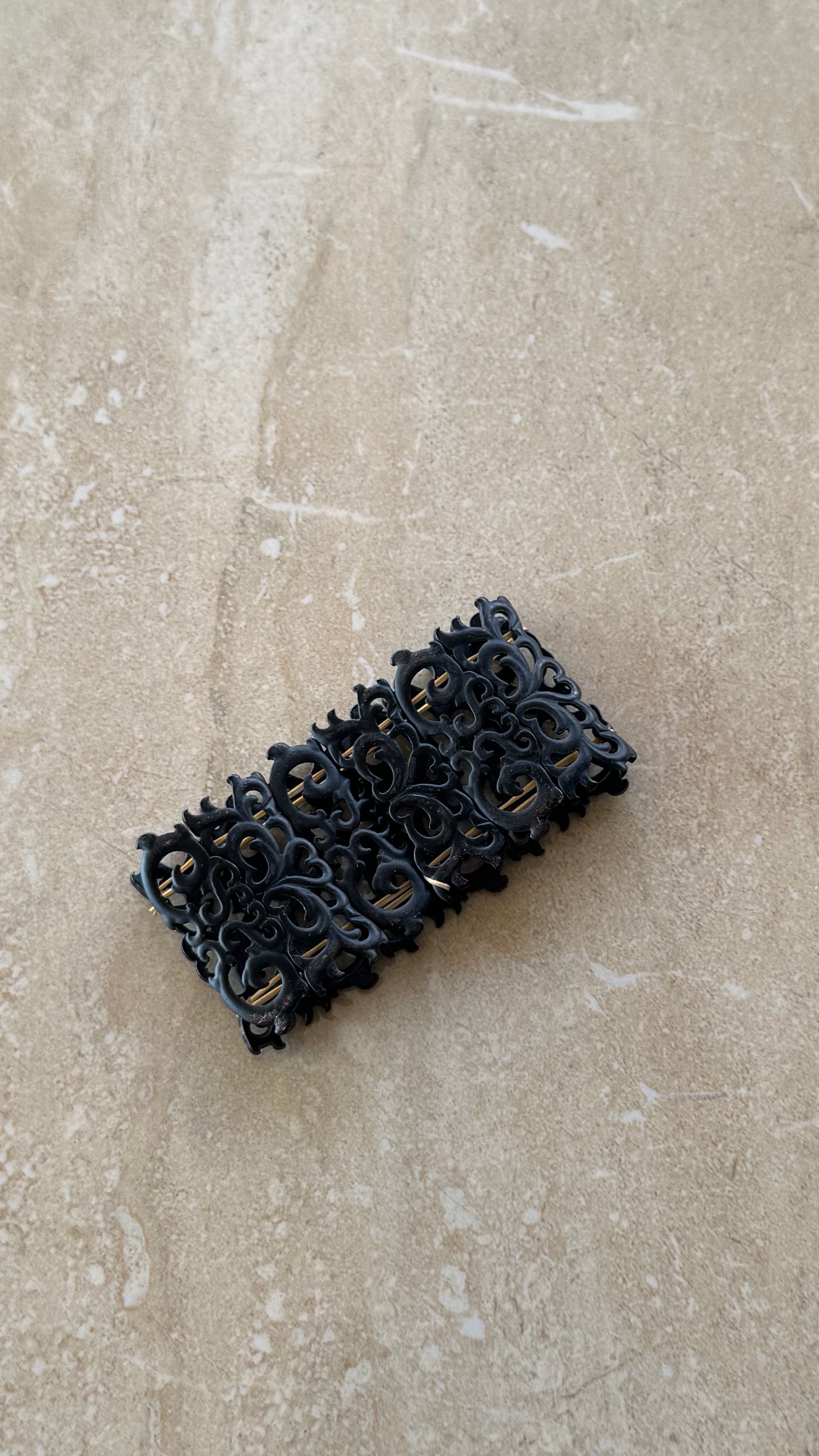 Artisanal Black Carved Openwork Stretch Cuff Bracelet with Gold-Toned Hardware
