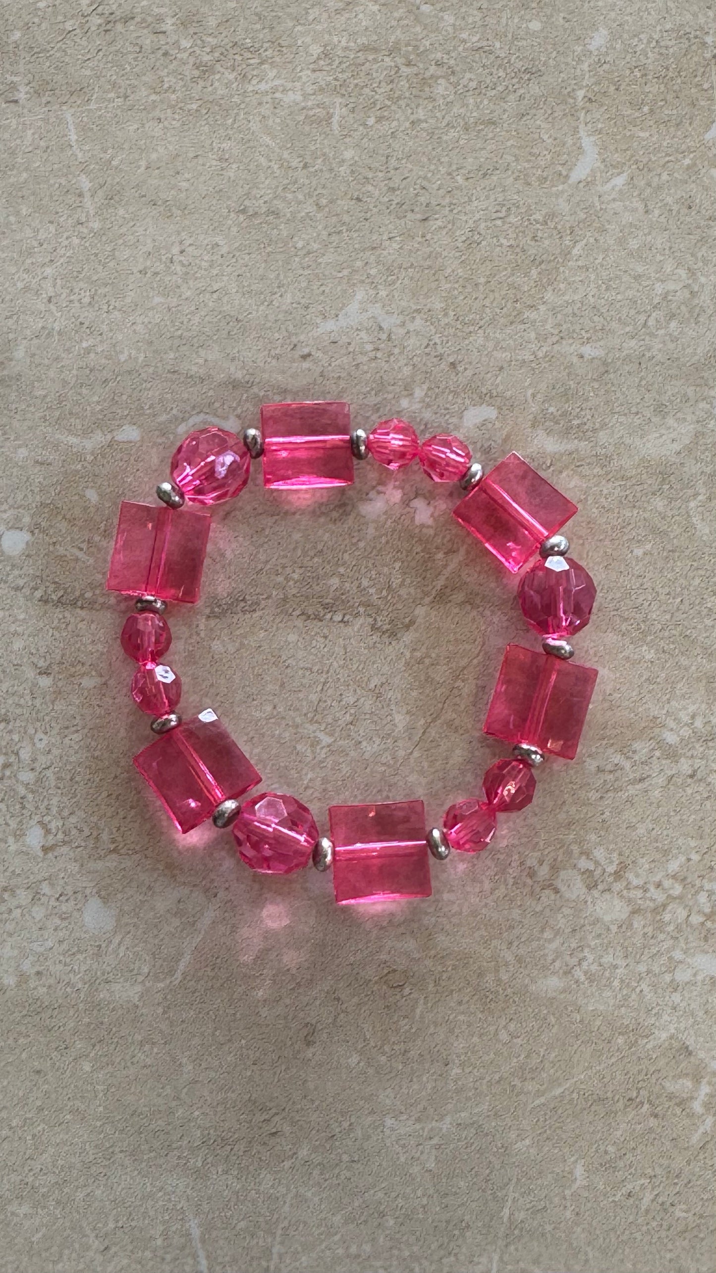 multi beaded pink flex bracelet 2(1/2)” diameter