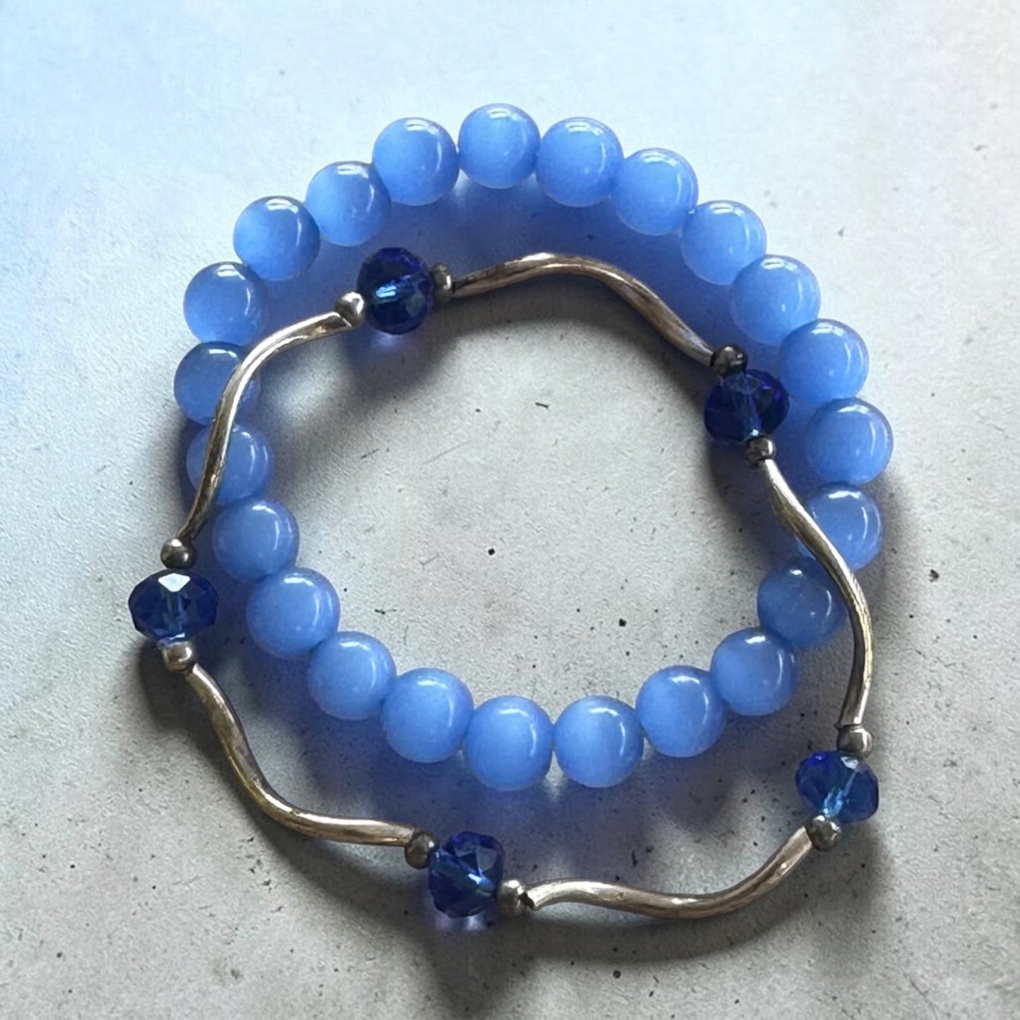 Two piece set blue beaded silver bracelets