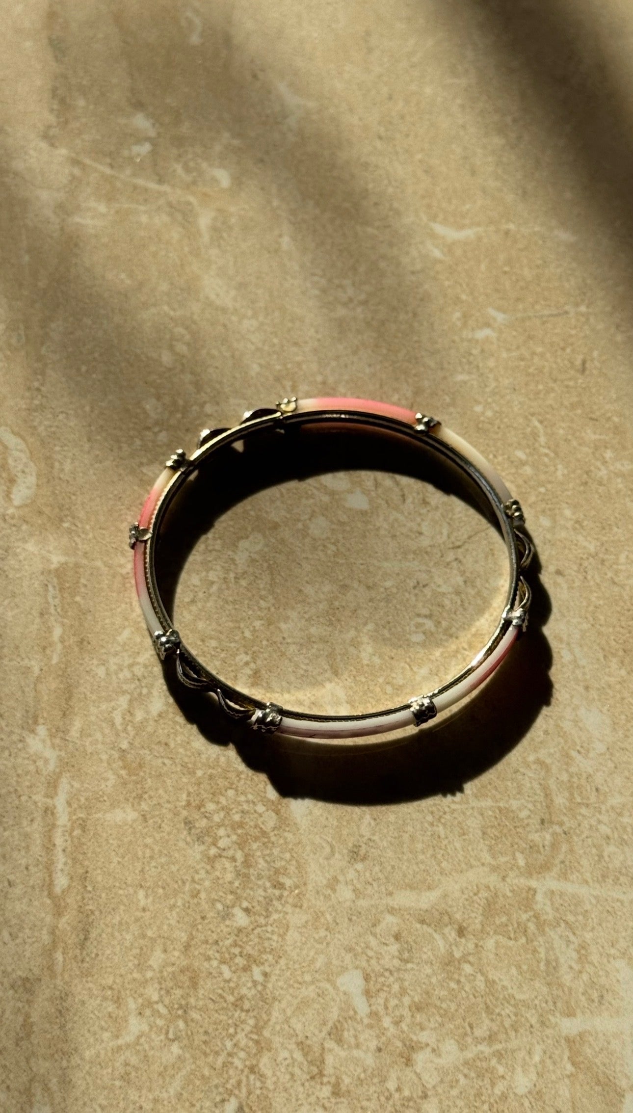Silver bangle cuff bracelet with red and white accents 2(1/2)” diameter