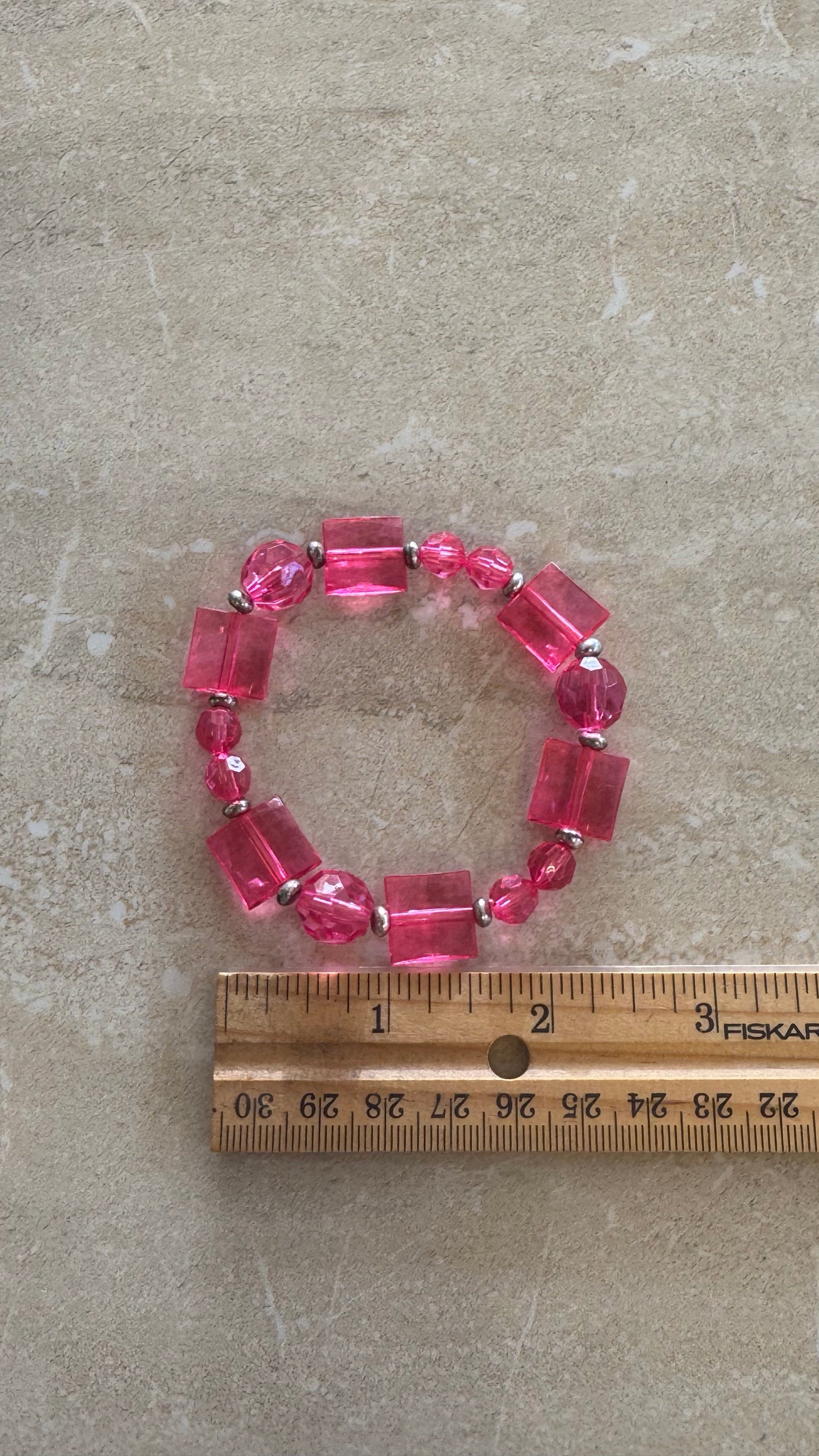multi beaded pink flex bracelet 2(1/2)” diameter