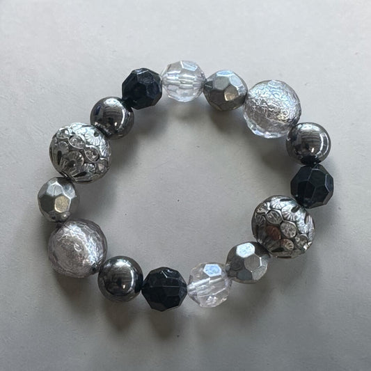 Vintage multi beaded black and silver flex bracelets 2(1/2)” diameter