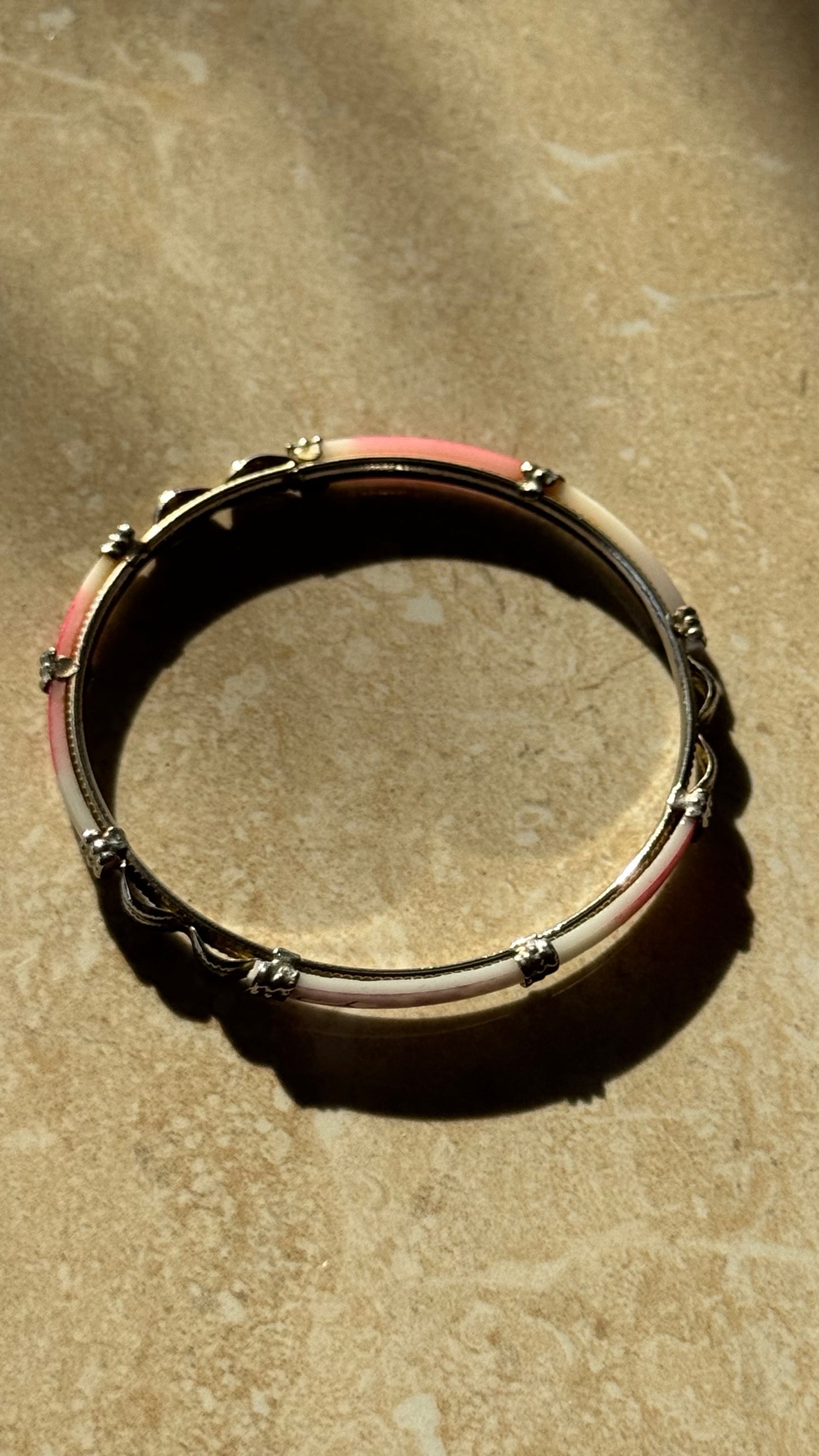 Silver bangle cuff bracelet with red and white accents 2(1/2)” diameter