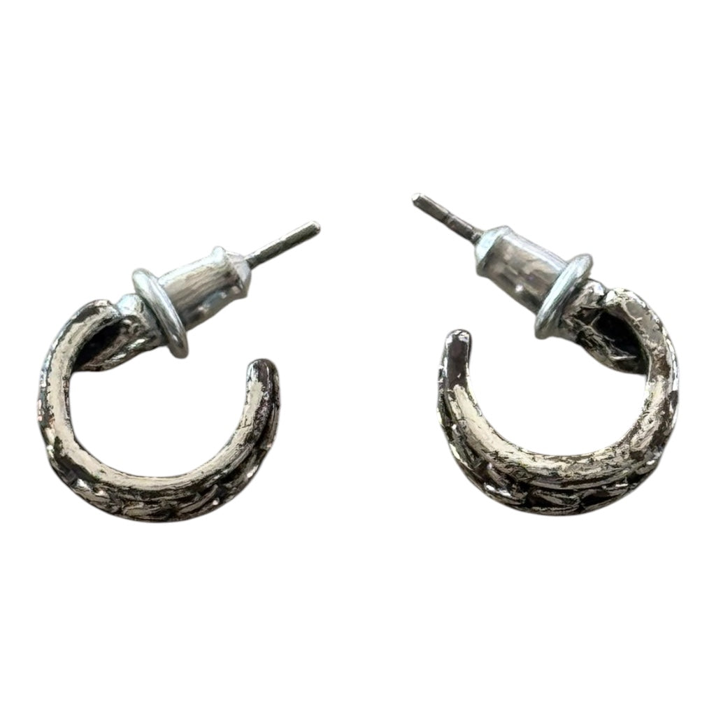 brutalist-style textured silver hoop earrings