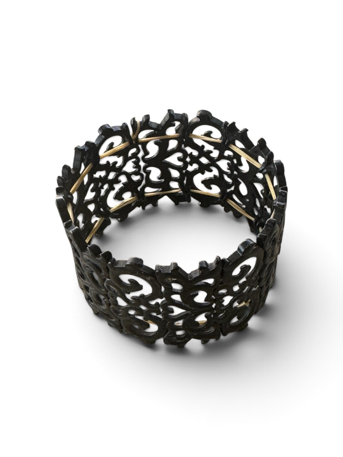 Artisanal Black Carved Openwork Stretch Cuff Bracelet with Gold-Toned Hardware