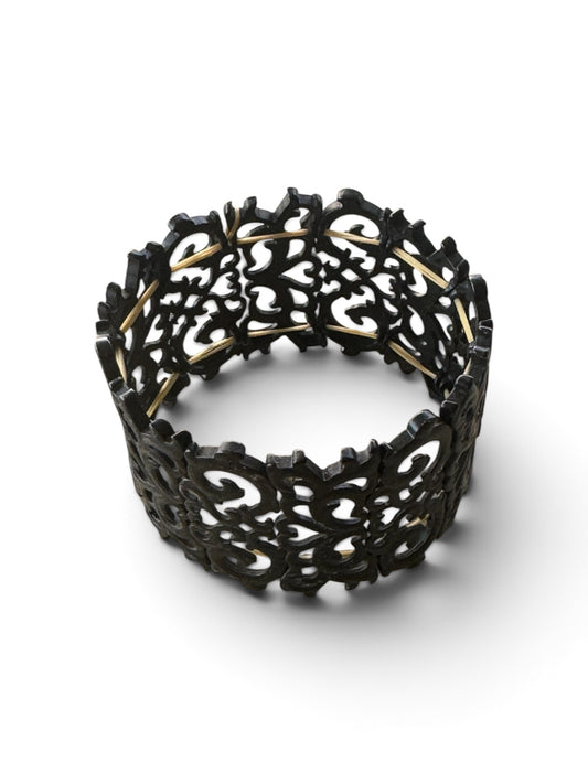 Artisanal Black Carved Openwork Stretch Cuff Bracelet with Gold-Toned Hardware