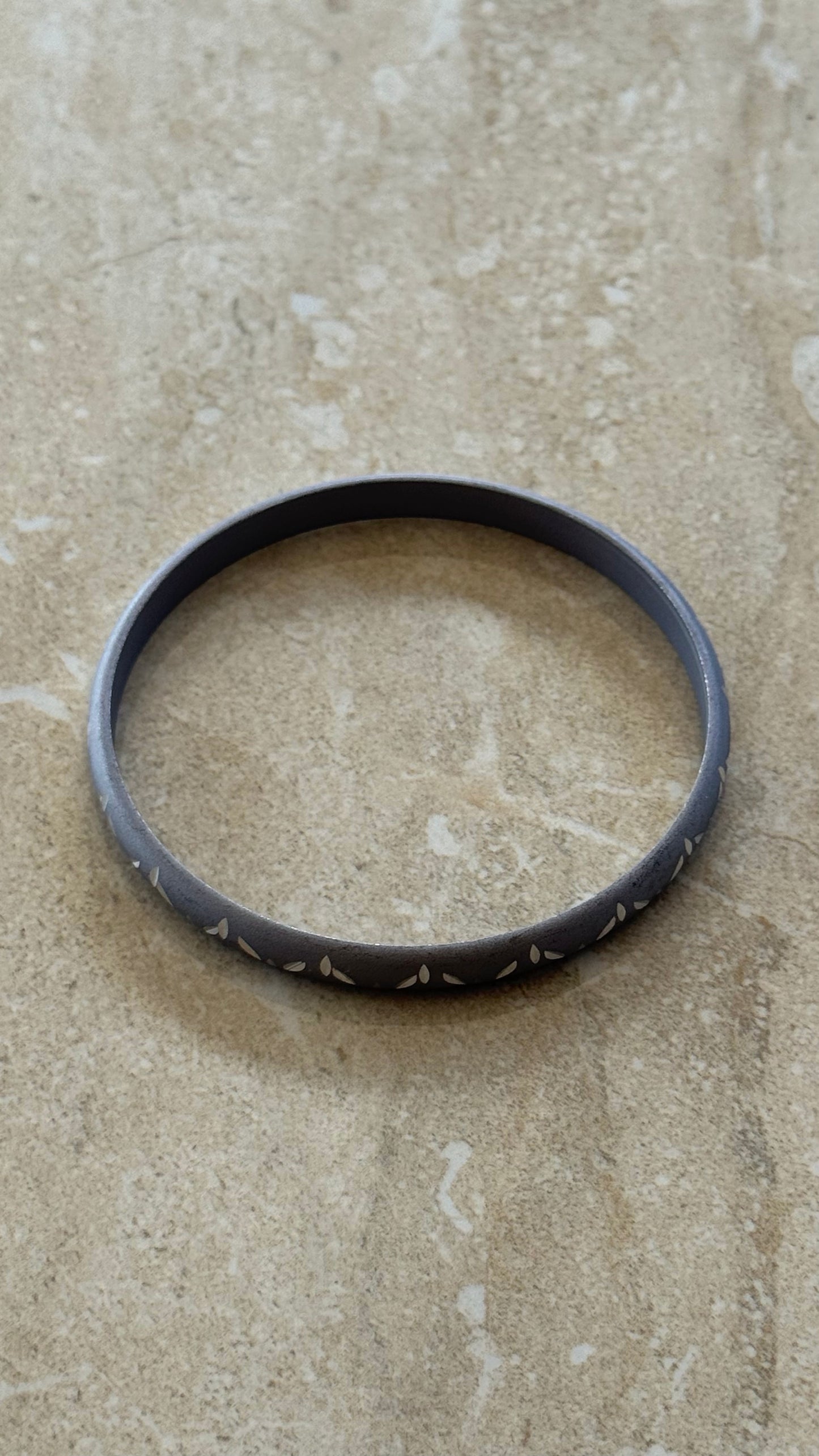 matte grey engraved metal bangle bracelet 2(1/2)” diameter
