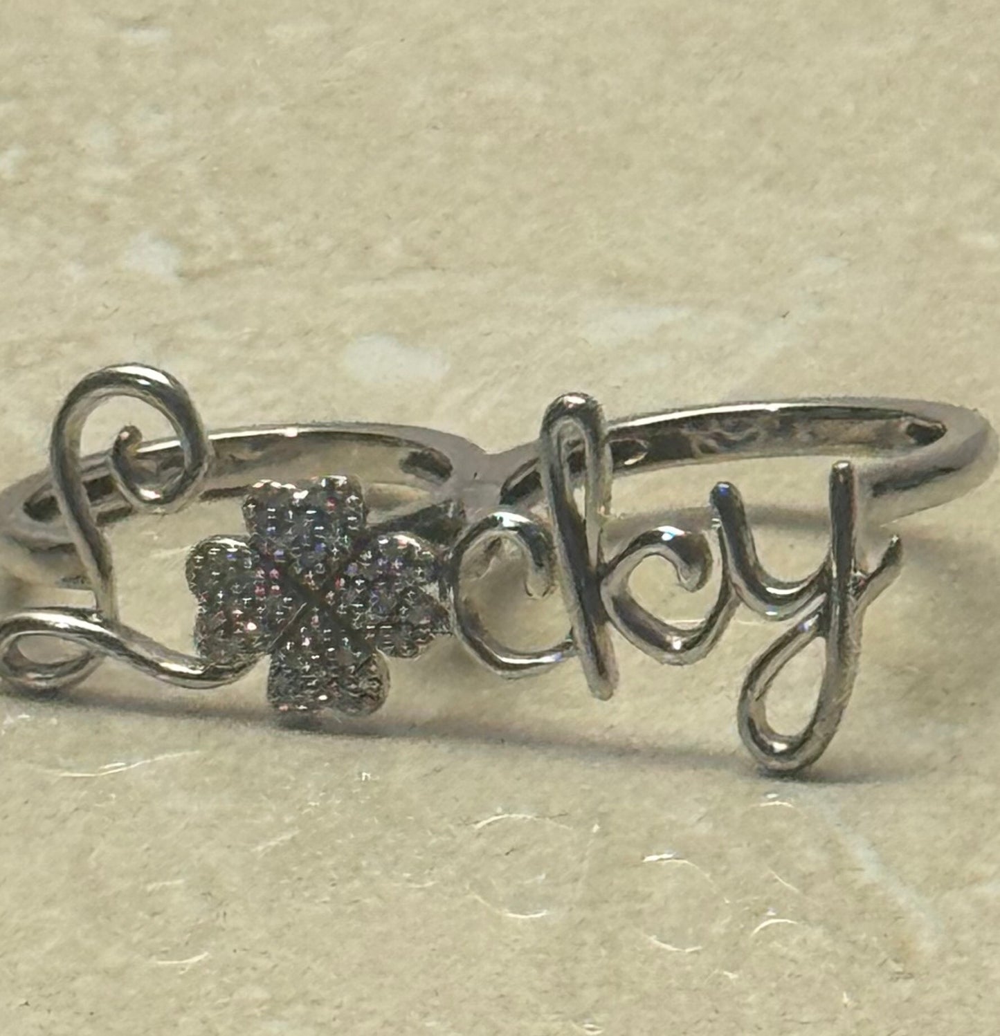 Palace Jewelers Two-Finger "Lucky" Script Ring with Pavé Four-Leaf Clover. SIVE 7 Sterling Silver